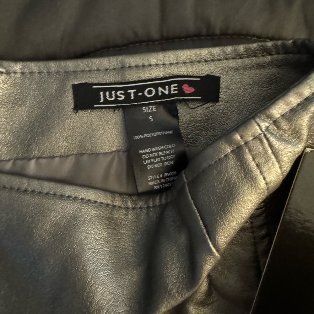 Silver, mini skirt. Lined. Never been worn.